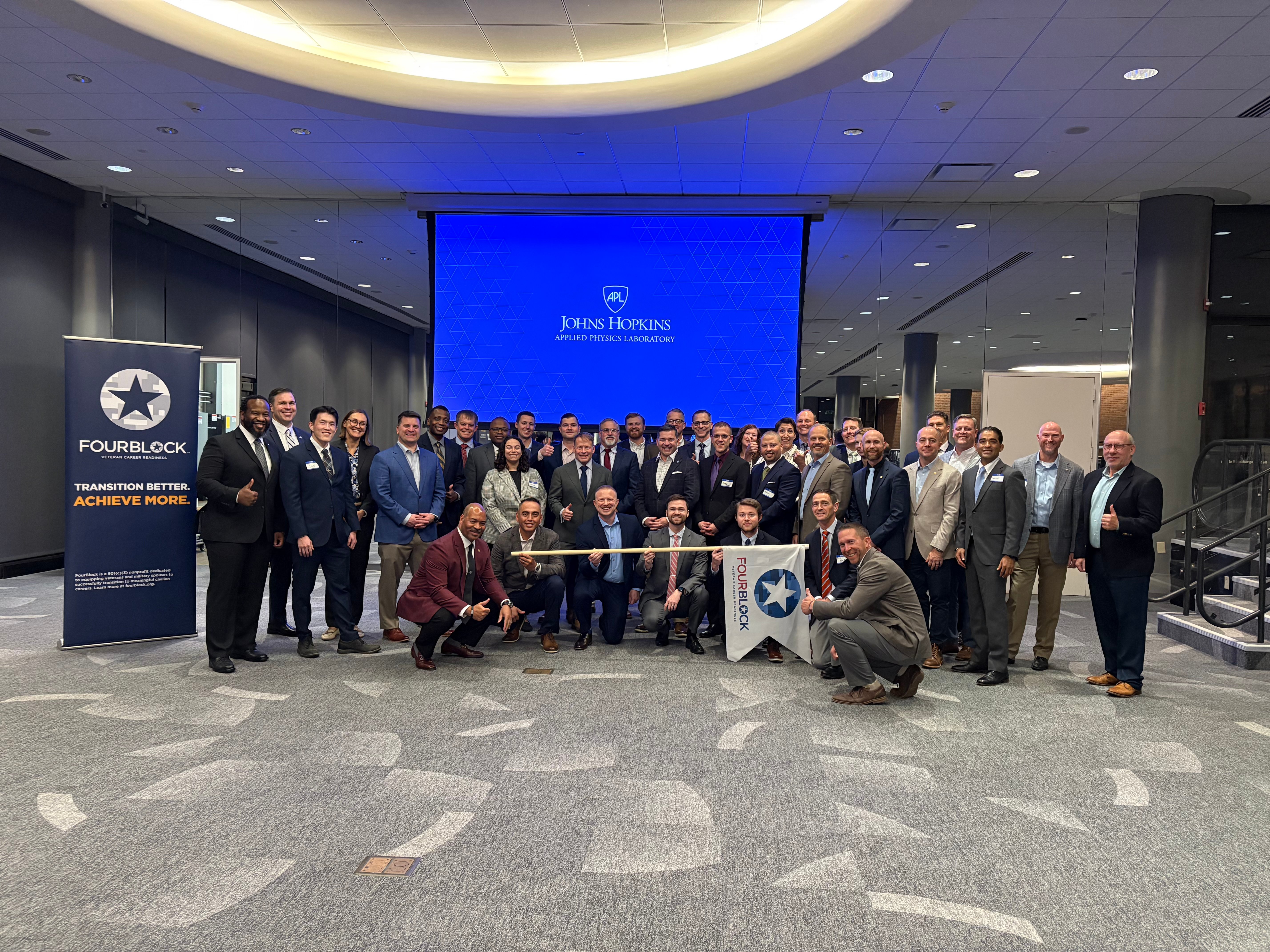 Fall 2025 graduation NCR John Hopkins -Wide group shot (1)