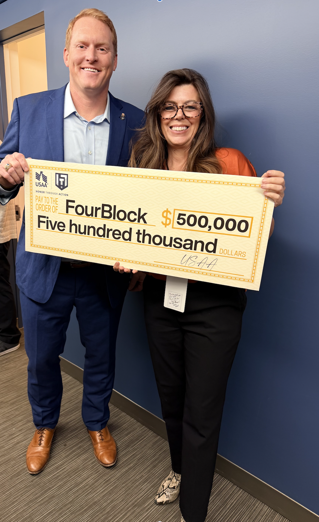 thumbnail_karin and david with check 2